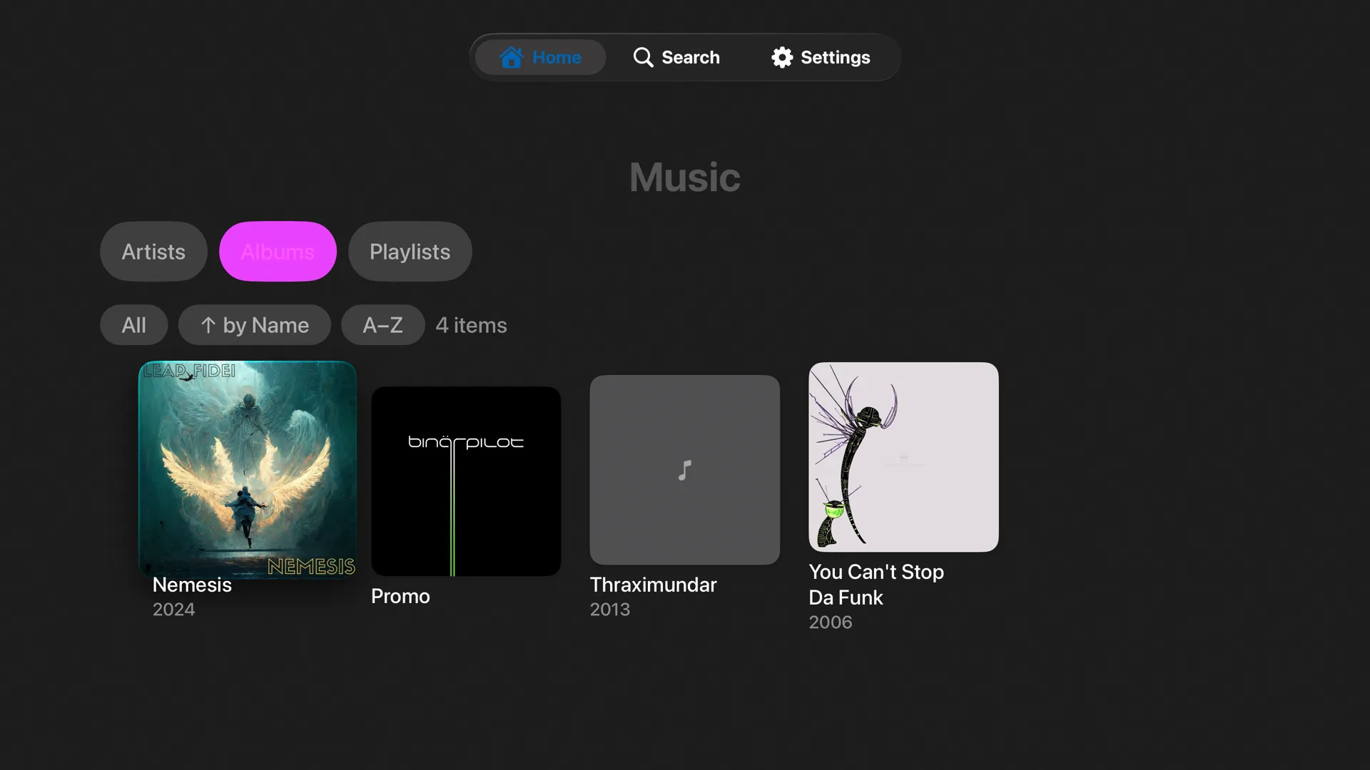 Music library showing albums, with Artists, Albums and Playlists tabs